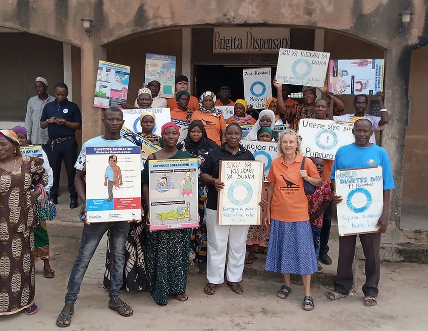 Co-founder Dr Hildegard Vogt, some of the staff and community members in front of Brigita Dispensary on World Diabetes Day