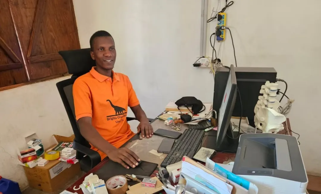 Brigita's IT specialist at his desk