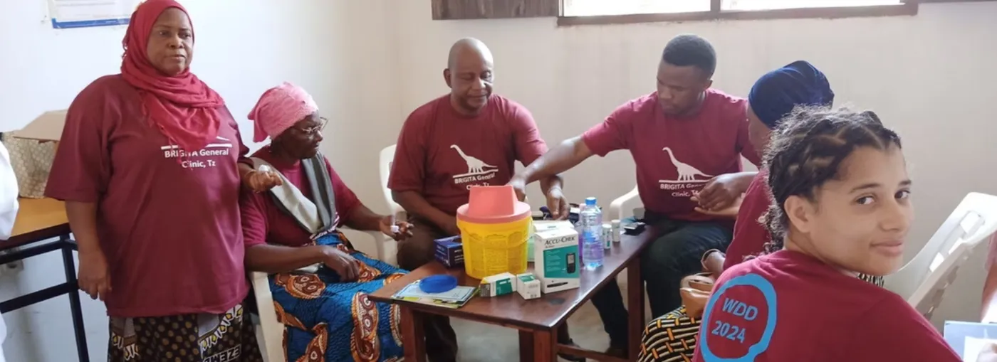 The Brigita team testing blood sugar on diabetes day